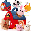 Children's farm toy set with colorful barn and animal figures on a white background
